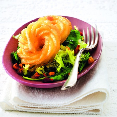 Fried Potato Rings with Bacon Bits and Salad