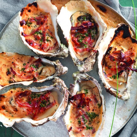 Oysters au Gratin with Speck and Marsala Cream