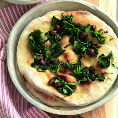 Pizza Topped with Artichokes and Wild Greens