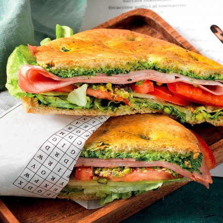 Mini Focaccia With Mortadella, Pistachios, and Tomatoes